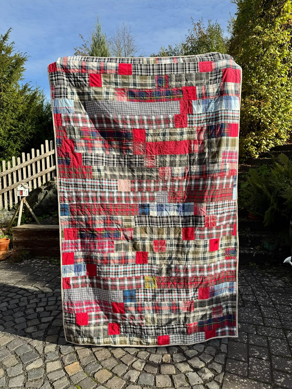Flannel No. 2: Made from used flannel shirts. Machine pieced and quilted.