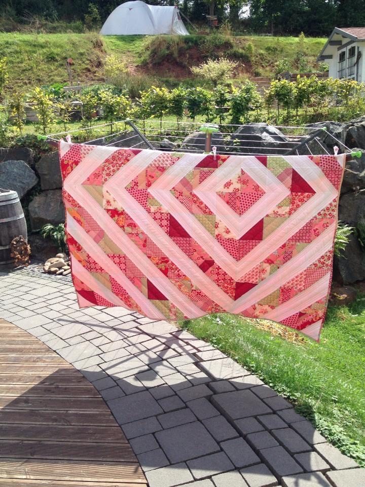 Mia’s Quilt: Half square triangles waterdrop echo.