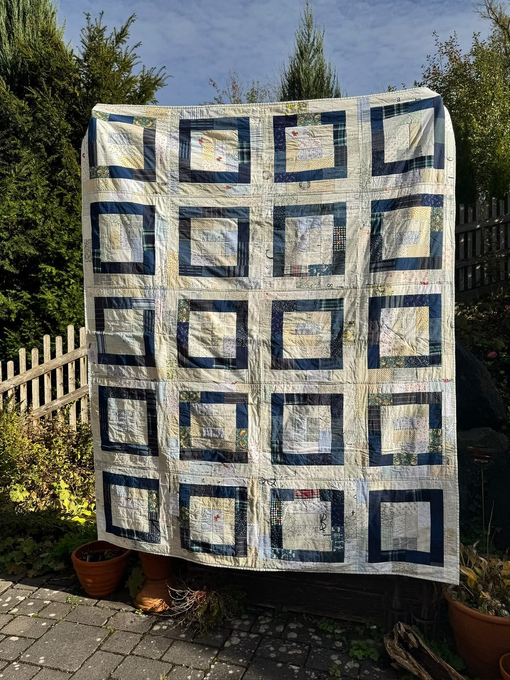 Potato chip No. 2: a quilt with dark blue squares on a light background.