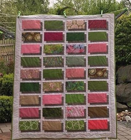 Floating Blocks: Machine pieced, machine quilted.